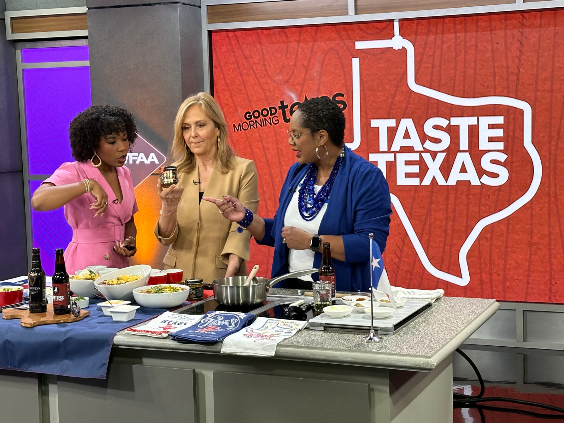 Chef Lorious with the Good Morning Texas hosts beside bowls of Texas Style Guinness Stew
