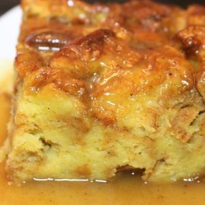 A close up of bread pudding on a plate