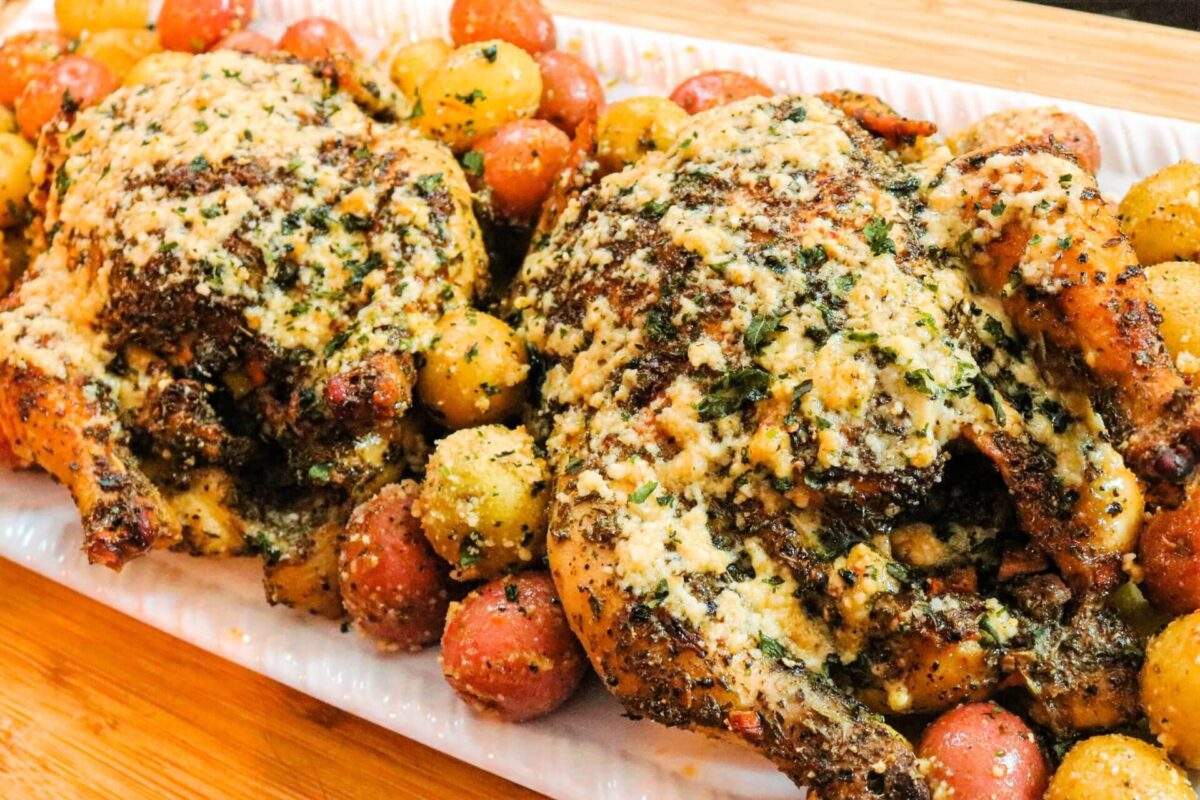 A Garlic Parmesan Roasted Chicken on Potatoes